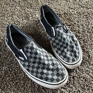 Black and grey checkered vans